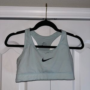 Nike sports bra light blue color (small snag on front, picture included)